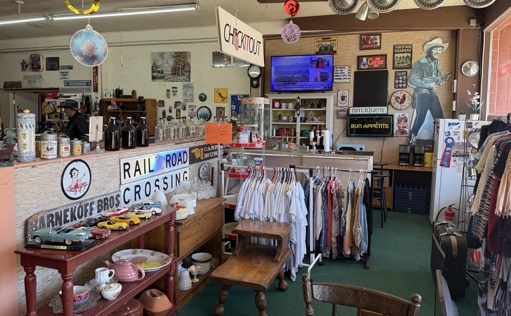 The DTF Trading coffee counter with a coffee menu board and vintage decor
